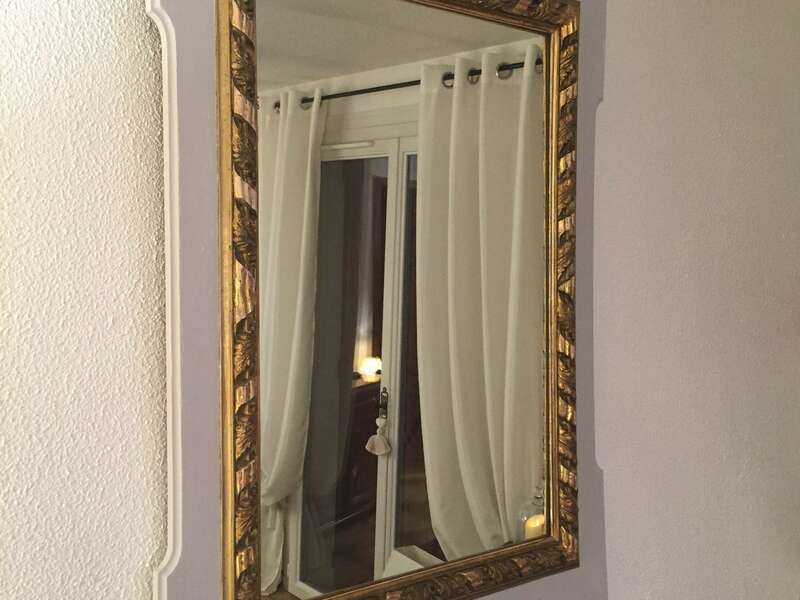 Miroir style empire, patine du contour en gris et bois brut