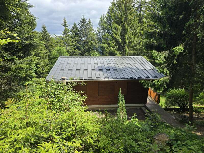 Particulier à GERARDMER (88) : remplacement d’une couverture en shingle par une couverture en panneaux sandwiches épaisseur 140mm