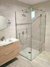 PORTE ET FIXE DE DOUCHE SUR MESURE EN VERRE CLAIRE