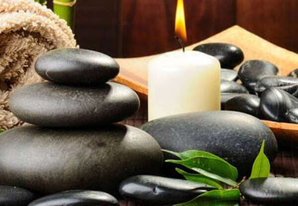 Les bienfaits du massage aux pierres chaudes en hiver