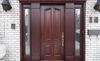 Porte d'entrée en bois sur mesure massive
