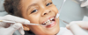 Enfant au fauteuil lors d'un premier bilan d'orthodontie
