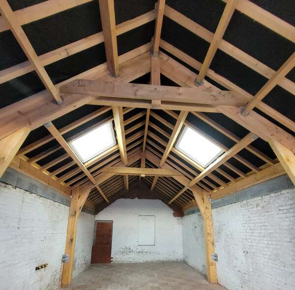 Création d'une charpente pour garage destiné à recevoir un camping car 