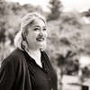 Femme souriante symbolisant accompagnement et formation professionnelle
