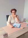 Femme au bureau praticienne sophrologie EFT Montauban