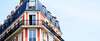 Bâtiment haussmannien symbolisant gestion de patrimoine optimisée