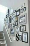 Exercices de styles décoration intérieure valenciennes murs de photos dans escalier