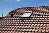 velux installé dans un toit en pente