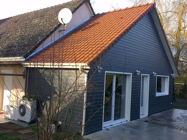 agrandissement traditionnel bois noir toit orange