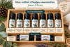 Coffret huiles essentielles avec étiquettes botaniques variées