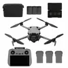 DJI Mini 5 Pro déplié avec radiocommande, batteries de rechange et sacoche de voyage