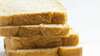 Pain de mie industriel avec un Nutri-Score A, souvent perçu comme sain malgré une liste d’ingrédients longue et transformée.