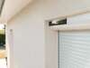Installation de volets roulants et battants