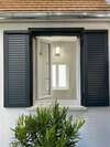 Installation de volets roulants et battants