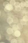 cercles lumineux en bokeh sur fond beige