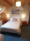 chalet bois jurassien chambre praline