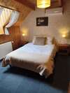 chalet bois jurassien chambre praline