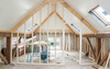 Rénovation de maison traditionnelle avec charpentes en bois