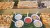 Livreur du Petit Traiteur 95 deposant un buffet froid a domicile