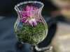 Petit vase décoratif avec fleur rose pour événements privés