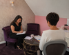 Séance de coaching personnalisé en visio avec couple et professionnel