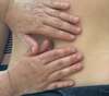 massage bien-être aux huiles essentielles dans une ambiance apaisante