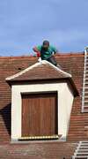 artisan rénovation en action sur chantier