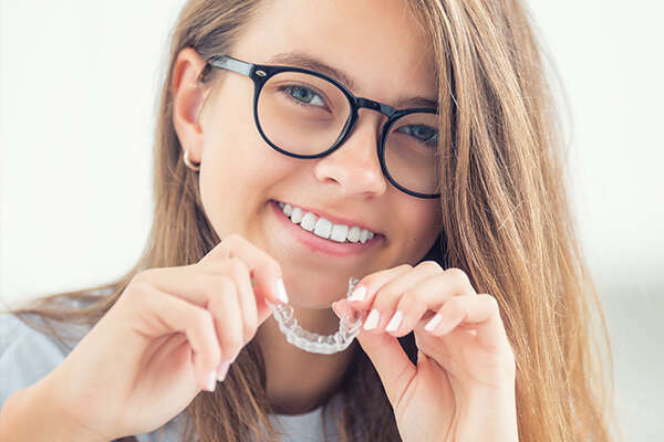 Les aligneurs de type Invisalign pour les adolescents