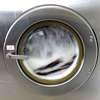 lave linge plombier paris