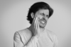 Symptômes du choc dentaire sur les dents sensibles