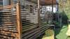 Mobil-home terrasse bois avec mobilier jardin et chaises longues