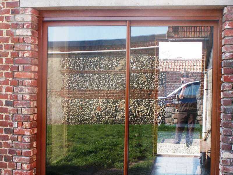 baie_coulissante_alu_chene_dore_a_vertain