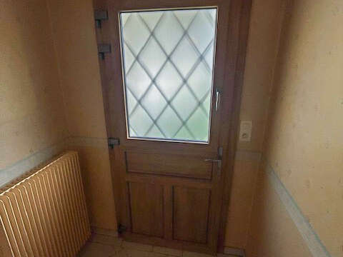 Porte d'entrée gamme authentique avec vitrage dépolie et grille de défense savoie - vue intérieur