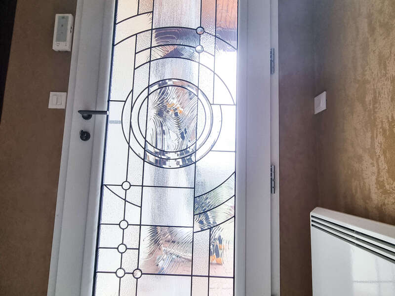 Porte d'entrée vitrée en aluminium - vue intérieur