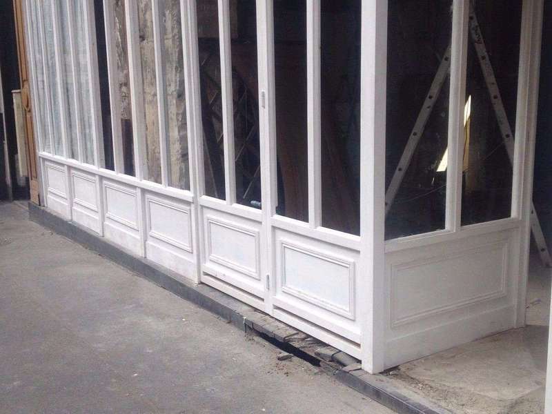 Prestation façade magasin bois Paris, AMF Menuiserie