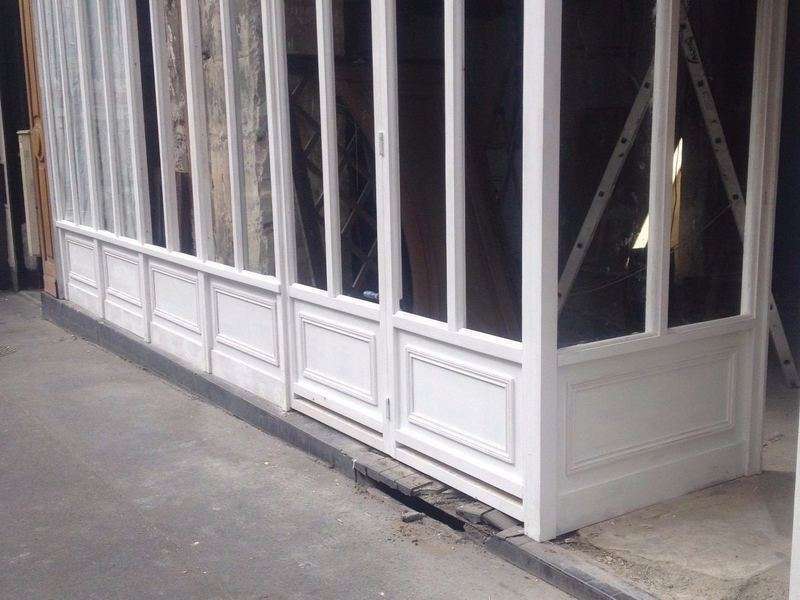 Prestation façade magasin bois Paris, AMF Menuiserie