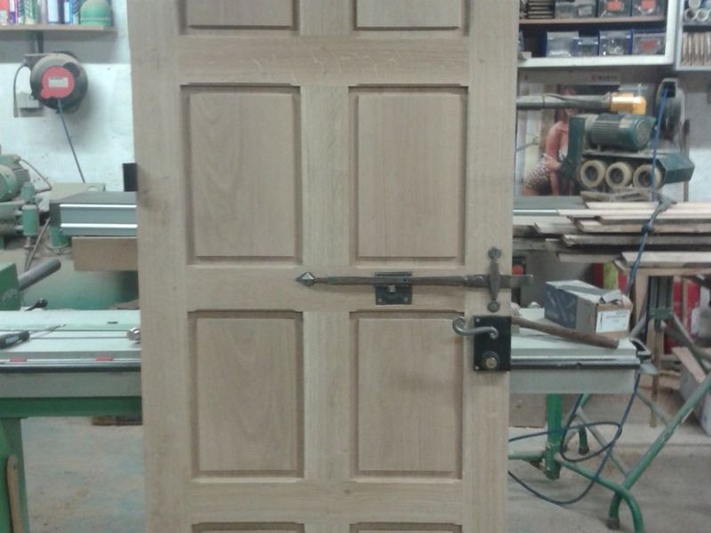 PORTE CINTRÉE EN CHÊNE MASSIF