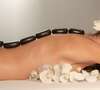 massage du dos aux pierres chaudes
