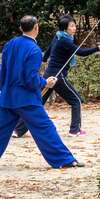 practice qi gong in serene outdoor settings