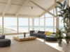 Salon blanc avec belle vue sur véranda et la mer 