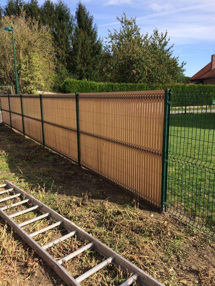 Création de clôture en panneau rigide avec occultation 