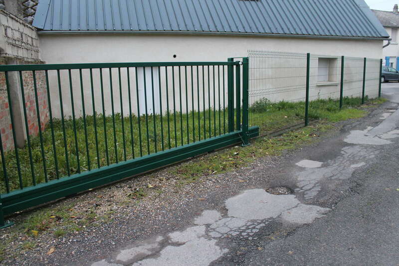 Aménagement extérieur avec création de puits perdu et passage fourreau pour portail électrique