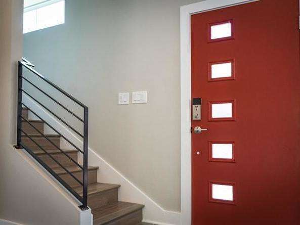 red-wooden-door-beside-stairs-922796