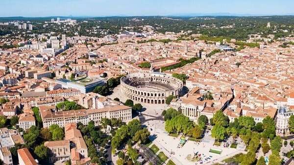 Augmenter ses revenus locatifs à Nîmes : tarification dynamique et visibilité en ligne