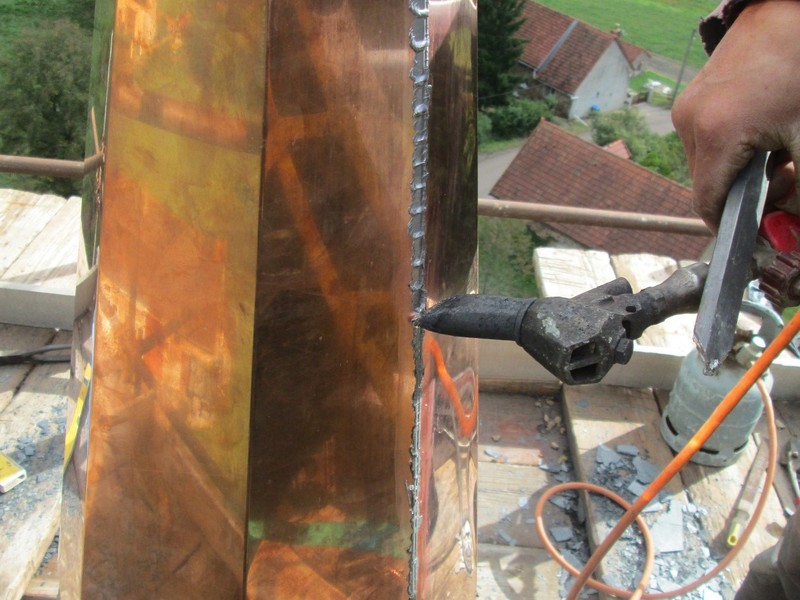 Soudure sur place d'un épi de clocher en cuivre.