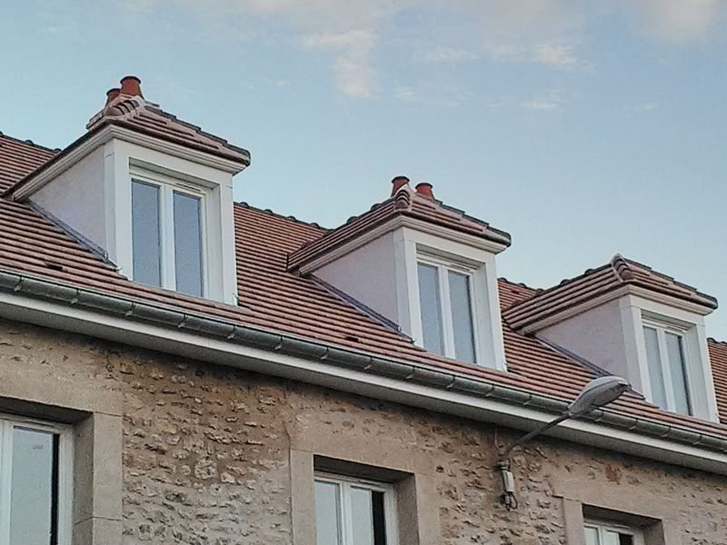 Lucarnes capucines rénovées.