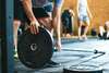 athlète en préparation physique avec coach