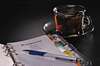 Stylo et cahier pour poser des objectifs SMART