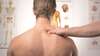 Évaluation du haut du dos et des omoplates en consultation de chiropratique