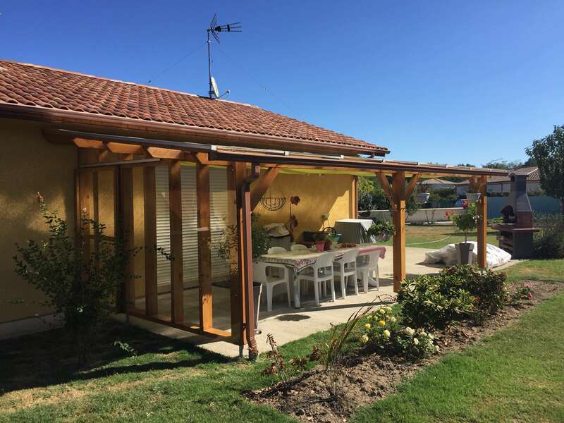 Pergola bois avec toiture translucide